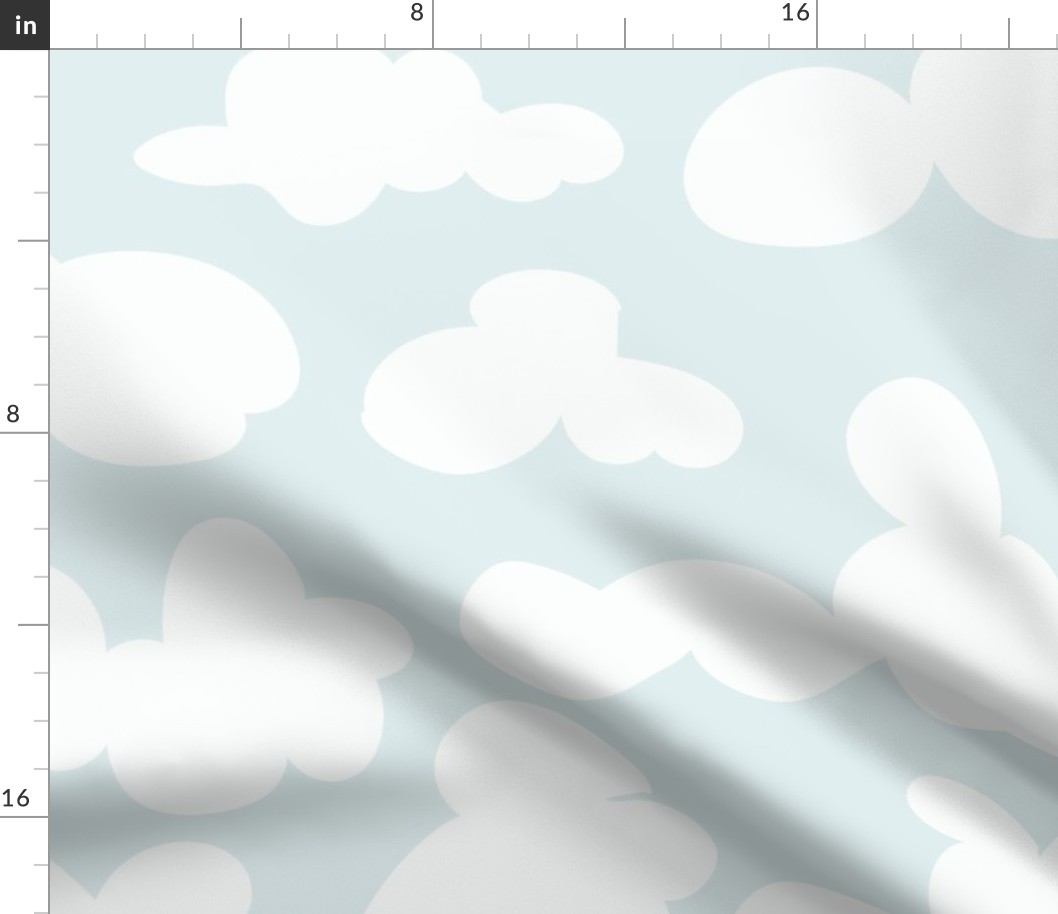 white puffy clouds on soft blue, large scale