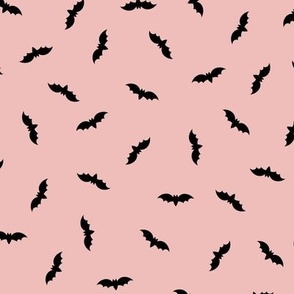 Small black Halloween bats on pink