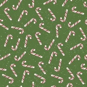 XS ✹ Festive Red and White Peppermint Candy Canes on a Green Background