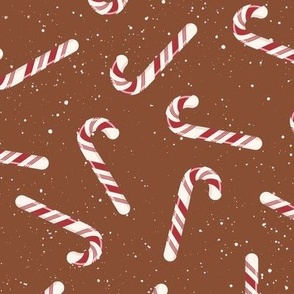S ✹ Festive Red and White Peppermint Candy Canes on a Brown Background