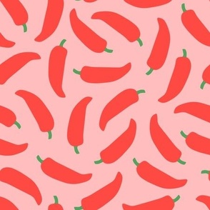 Chili Peppers  - spicy red chili peppers scattered on pink background