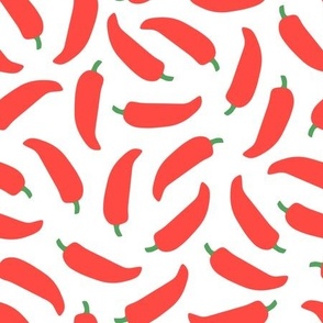 Chili Peppers  - spicy red chili peppers scattered on white background