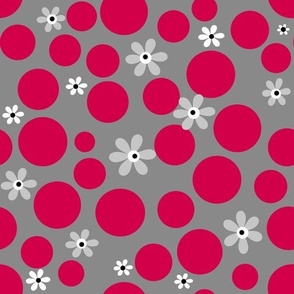 red polka dots and white flowers on a gray retro background 
