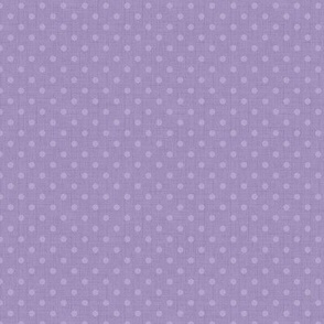 Monochrome textured small polka dot pattern. Lilac background.