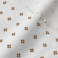classic chic cute mocha brown oolka dot flowers on white fashion fabric 