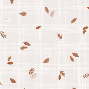 Hand drawn white and cream grid with scattered colorful fall leaves 