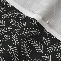 Small tossed stylized branches in black and white