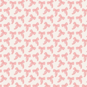 Blush pink bows tossed on a cream background Small