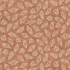 Scattered  white  leaves outlines on textured clay brown