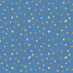 4” repeat tiny gold, bronze and yellow effect scattered, tossed non directional stars, blender for afternoon tea On cornflower blue