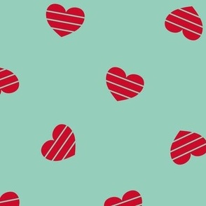 Large-Red Cutout Hearts on mint green