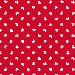 Small-White Cutout Hearts on red