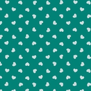Small-White Cutout Hearts on turquoise