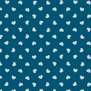 Small-White Cutout Hearts on blue