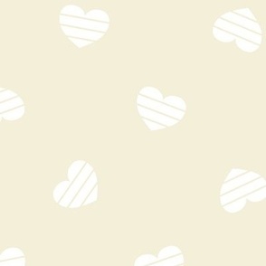Large-White Cutout Hearts on cream