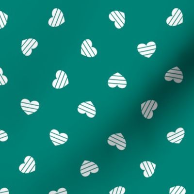 Medium-White Cutout Hearts on Teal