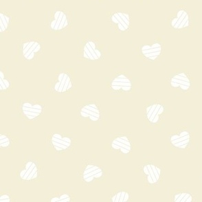 Medium-White Cutout Hearts on cream