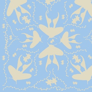 Cream moths on a blue background