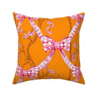Pink gingham bows on orange toile