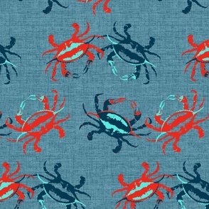 Large scale bright red and deep blue with aqua crabs on a washed blue denim texture. 