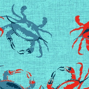 Jumbo scale bright red and deep blue crabs on a washed aqua blue denim texture. 