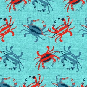 Large scale bright red and deep blue crabs on a washed aqua blue denim texture. 