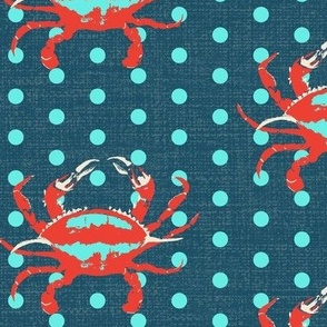 Medium scale bright red, aqua and beige crabs with polka dots on a washed denim blue texture. 