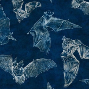 Brilliant bats on an indigo blue background 