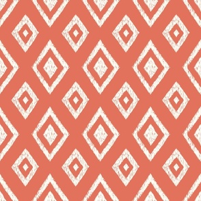 Ikat classic diamond Indie global textile pattern in natural white on terracotta, medium scale