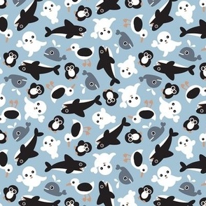Winter wonderland sealife animals for kids - tossed penguins birds whales orca and seals on blue