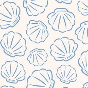 Blue seashells on off white