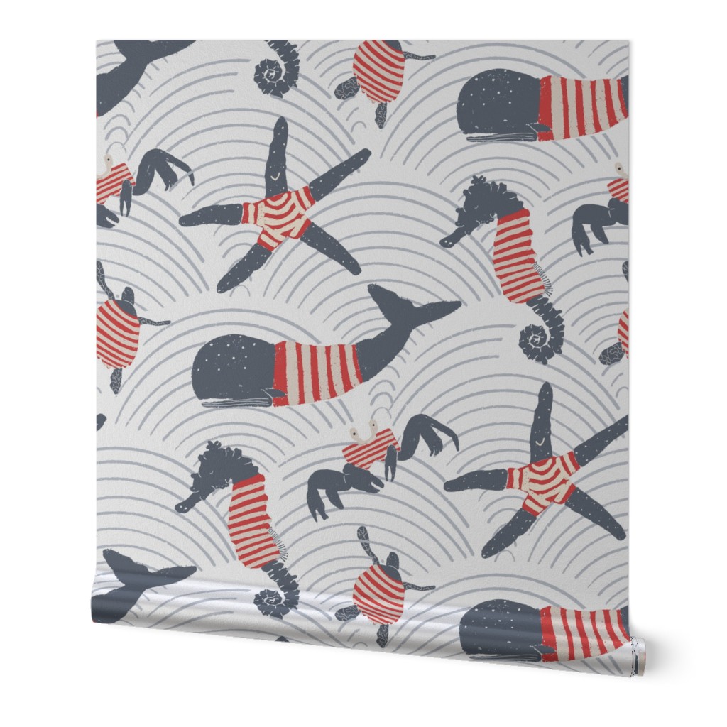 Oceanic creatures ( turtle, whales, seahorse) with texture and a vintage feel, light and dark blue, red and beige