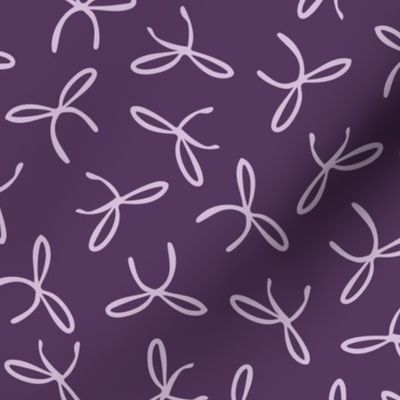 Freehand bows in polka dot style design - lilac on purple violet background