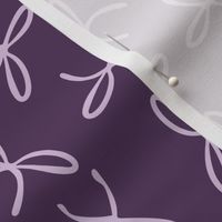 Freehand bows in polka dot style design - lilac on purple violet background