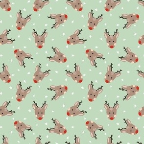 Small Cute Christmas reindeer on minty green