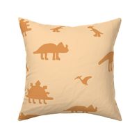 Dinosaurs in tossed print gender neutral halloween tones - orange and apricot
