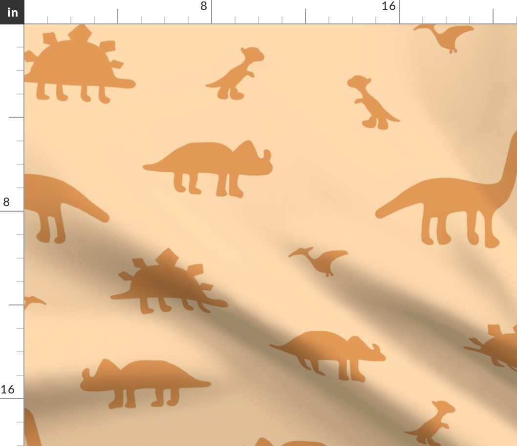 Dinosaurs in tossed print gender neutral halloween tones - orange and apricot