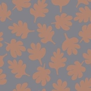 Autumn leaves on grey background