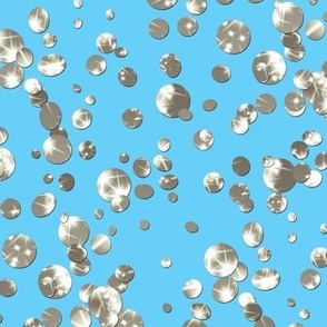 silver shiny glitter confetti on sky blue background