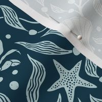 Coastal charm: block print style crabs, shells and starfish among flowing kelp fronds - coordinate design in two colors