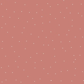 Tiny white hearts on redwood pink background
