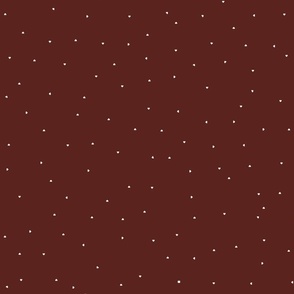Tiny white hearts on sienna burnt umber red background 