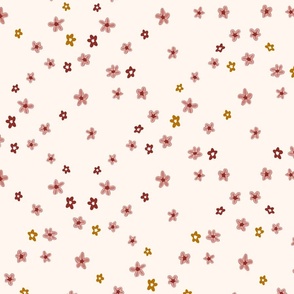 Pink, red, and yellow flowers on a linen background