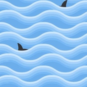 Shark Fins Among the Waves