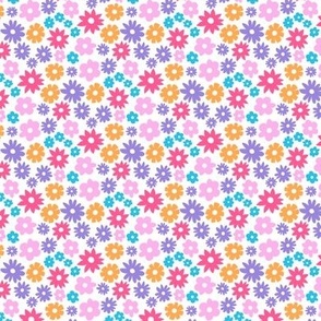 Tiny colorful pastel daisies on white background. Extra small scale daises. Small scale colorful flowers. Ditsy Flowers pink, purple, blue, red, yellow and white.