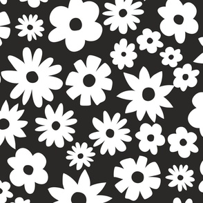Large white daisies on black background. Extra large scale daises on dark grey background. Jumbo black flowers. Ditsy Flowers black and white.