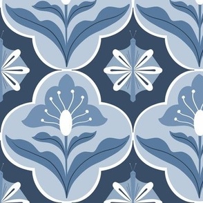 Retro tiles with floral and flutter in monochrome indigo tones