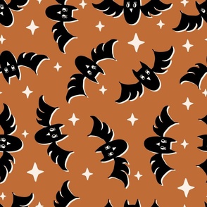 Cute Halloween Bats tossed in black on burnt orange for quilting and kids - Large Scale
