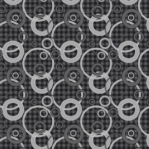 gray rings on a checkered background black and white 