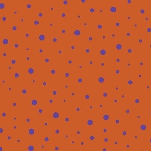 Small Purple dots on Orange background